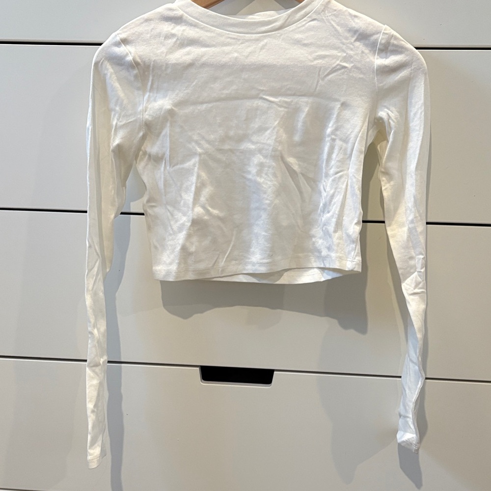 H&M White Long Sleeve cropped cream top.  Size 12/14